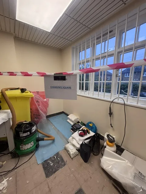 Asbestos floor tile and bitumen removal in Colindale